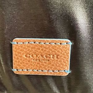 Coach baby changing pad. Coach logo embroidered in turquoise. New, never used.